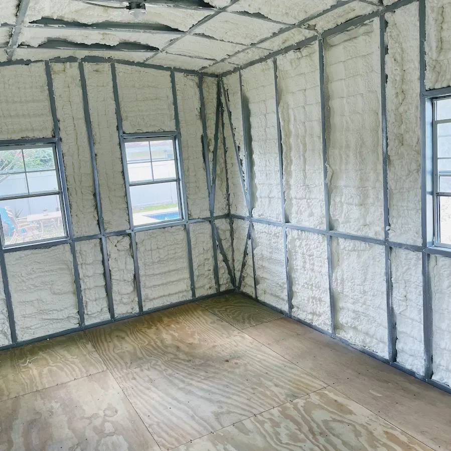 Closed-cell spray foam insulation applied to wall cavities in a residential project in Margaret